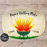 papa's grilling plate, dad's grilling plate, grill master 2023, featuring generic handprint art or flames, for barbecue lover from kids and pets