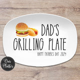 10x14&quot; oval white platter with text Dad&#39;s Grilling Plate Happy Father&#39;s Day 2024 in large text with a hamburger and hot dog in top left