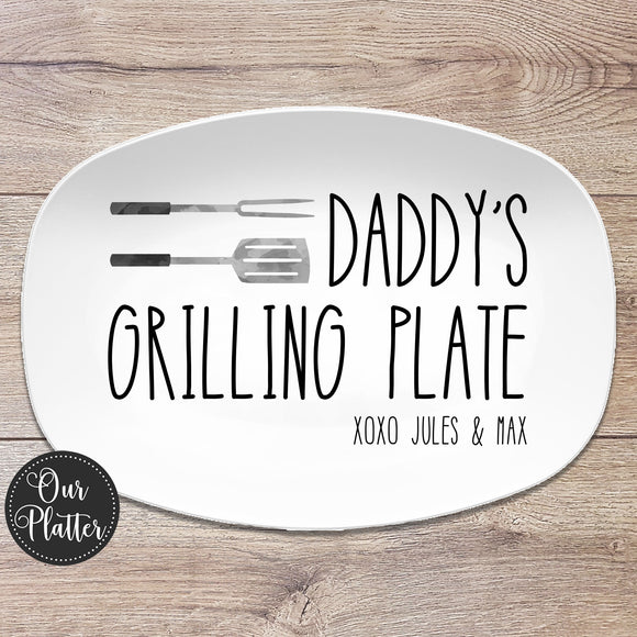 10x14" oval white platter with text Daddy's Grilling Plate in large text with a grill fork and spatula in top left
